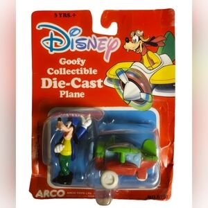 vintage Disney Goofy die-cast metal plane figure made by Arco Toys unopened